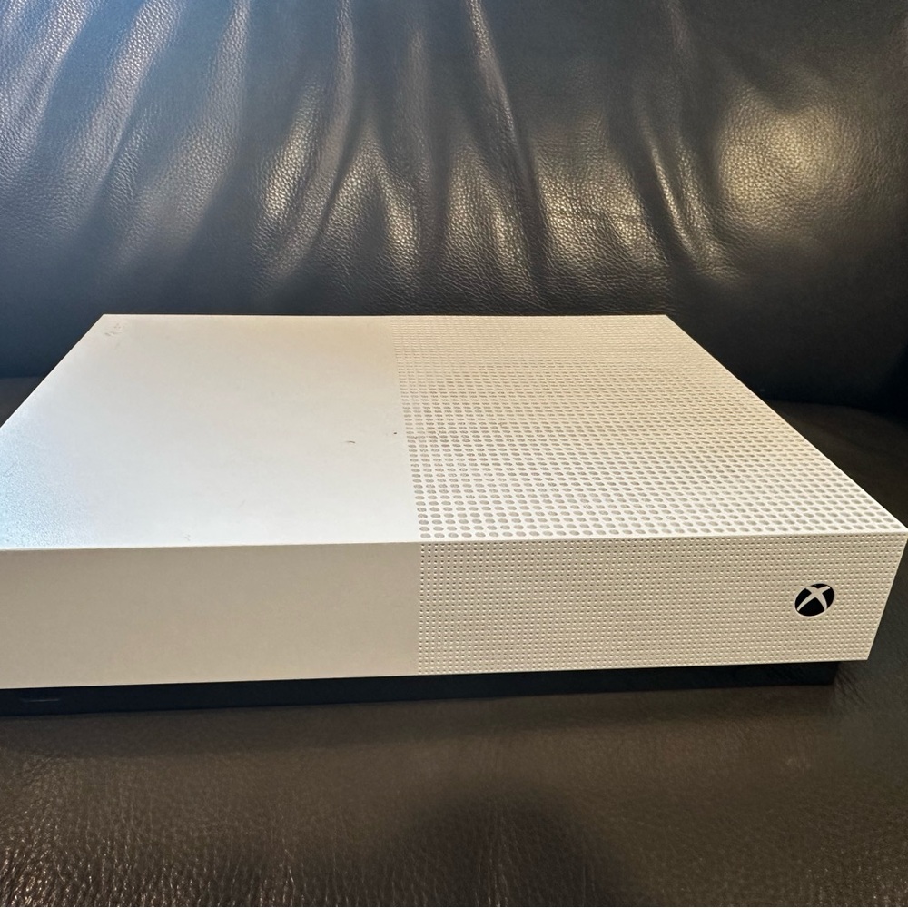 Xbox One S console with controller and HDMI cable